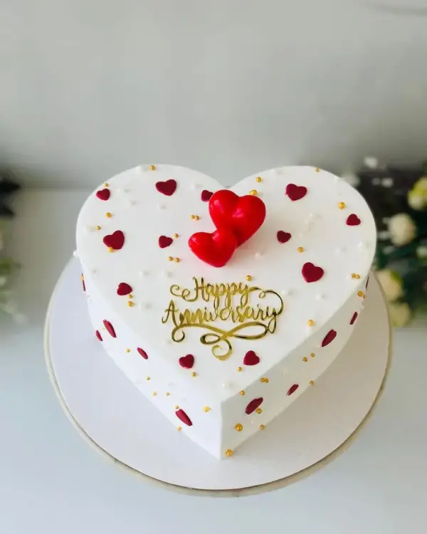 Elegant White Heart-Shaped Love Cake for Special Occasions