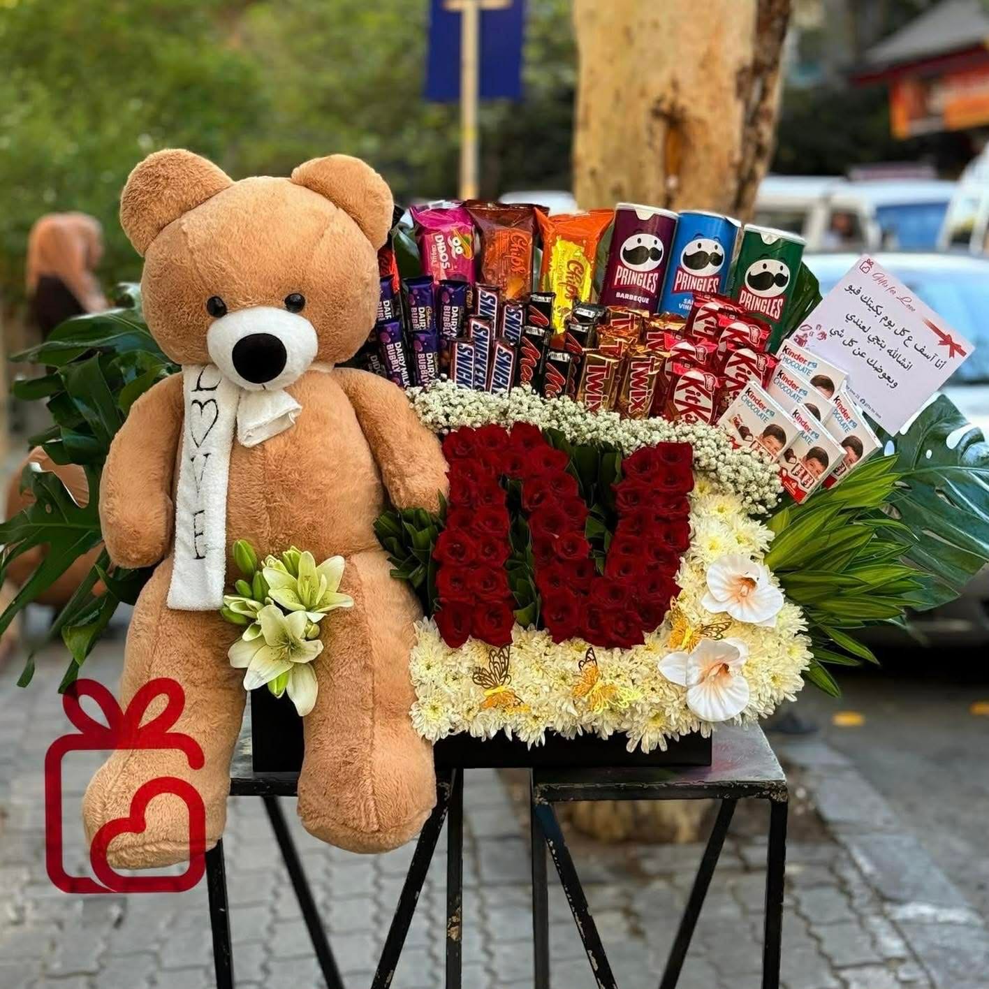 616802267_1279361447580616_3341864750734835611_n Teddy Bear & Chocolate Flower Gift Arrangement - Image 1