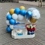 Anniversary Balloon Backdrop with Cake & Flower Bouquet