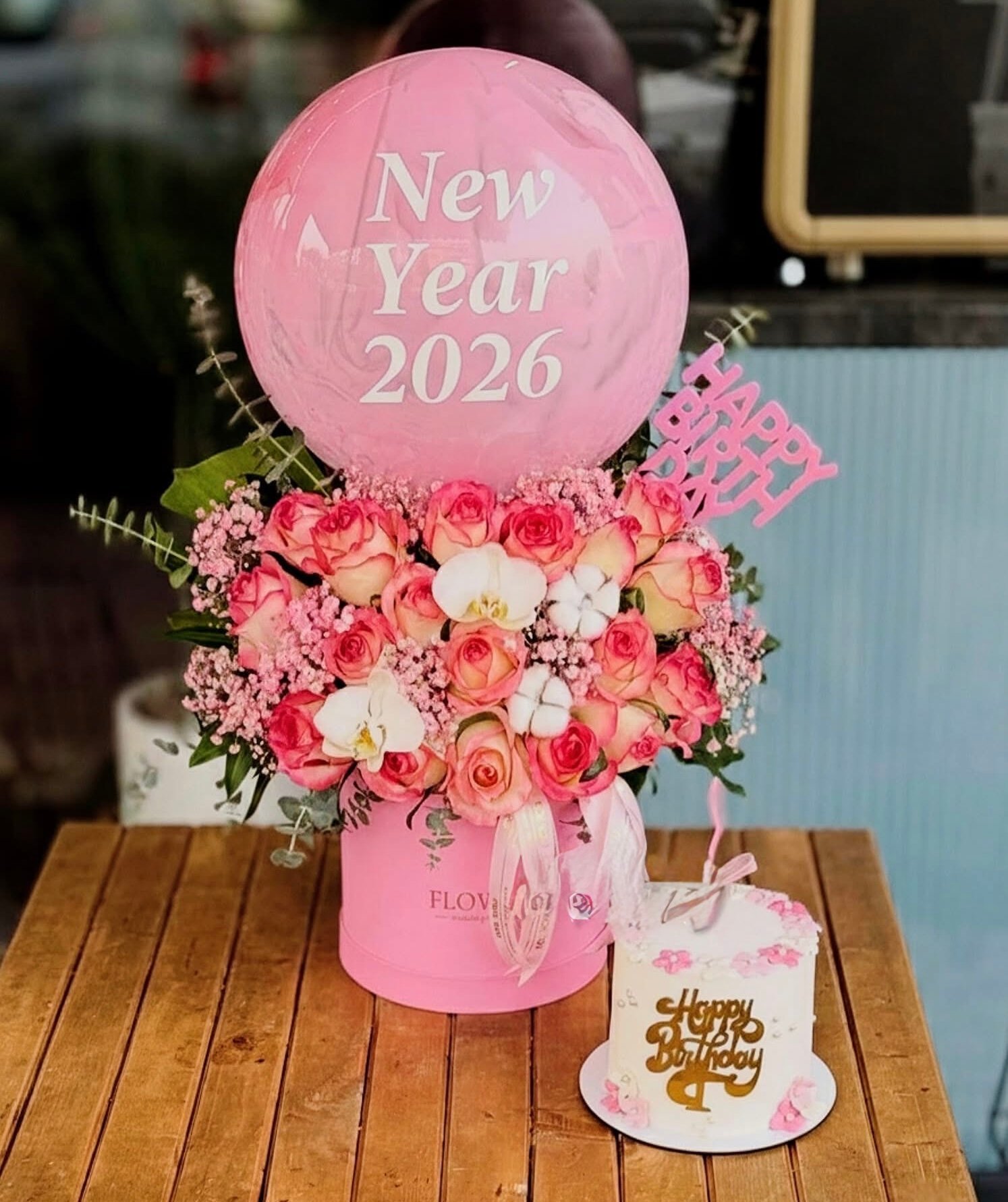 IMG_6450-1.jpeg New Year 2026 Pink Rose Flower Box with Cake – 500gm - Image 1