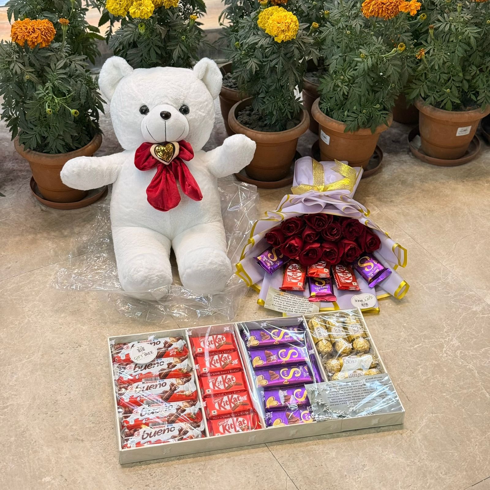 WhatsApp Image 2026-01-22 at 03.35.40 White Teddy Bear with Red Roses & Chocolate Gift Set - Image 1