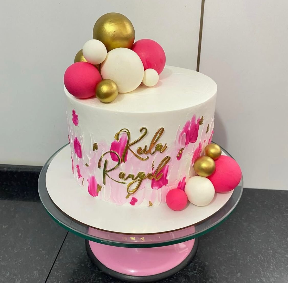 WhatsApp Image 2026-01-22 at 03.43.00 (2) Personalized Name Cake with Pink & Gold Spheres (1kg) - Image 1