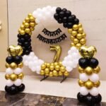 Black Gold White Balloon Ring Setup with Number Foil and Birthday Banner
